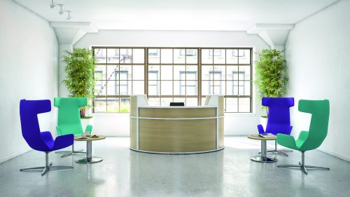 Breakout area design which is a little less formal than the other parts of the office. Comfortable, contemporary chair designs in a bright break out area.